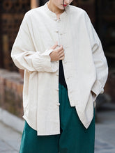 Blusas plisadas de color liso con cuello alto, mangas murciélago y botones de rana chinos sueltos.